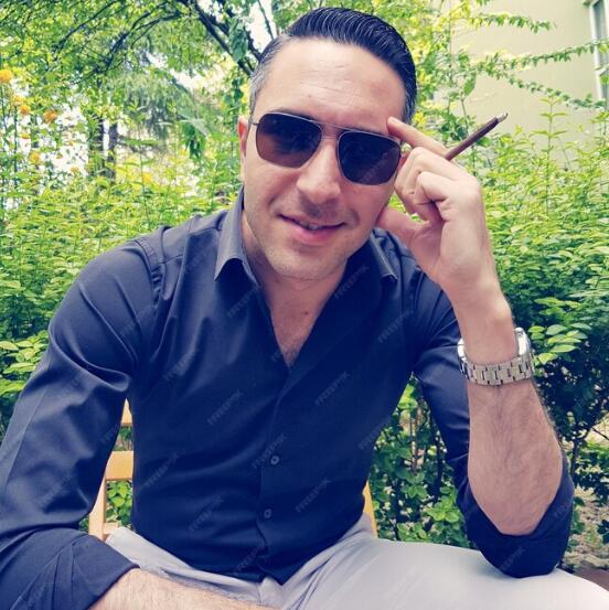 Male model in sunglasses outdoors